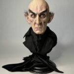 A hyper-realistic silicone bust of Count Orlok from Nosferatu.